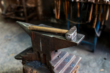 Hammer and anvil. Close-up.