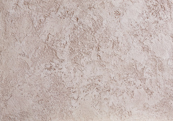 Close-up surface detail of old rough white plaster wall texture, macro.