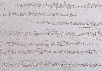 Beige plaster textured background. Abstact beige stucco. Texture of plaster on the wall.
