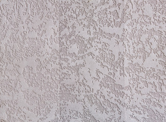 Beige plaster textured background. Abstact beige stucco. Texture of plaster on the wall.