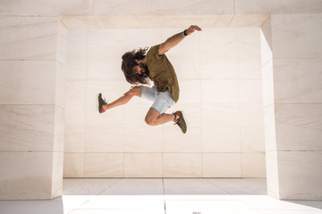 man jumping with a white background