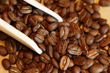 a small amount of golden coffee beans