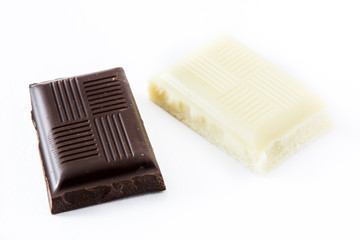 Black and white chocolate bars isolated on white background