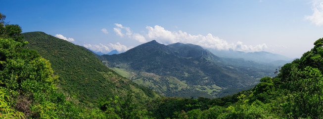 Naklejka na ściany i meble Calm anв Mediation panoramic view of a mountain with blue sky and clouds on background in Sri Lanka.