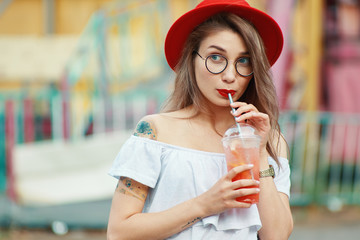 Curious girl  waiting for party news on colorful background