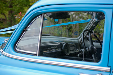 Detail of a blue vintage Chevrolet motor car