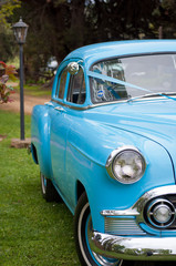 Fototapeta na wymiar Detail of a blue vintage Chevrolet motor car