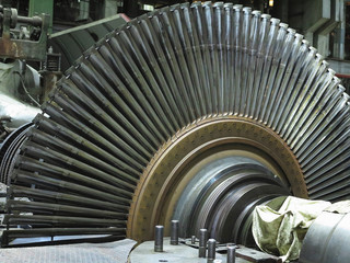 Disassembled steam turbine in the process of generator repair at power plant