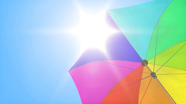 Loop: Sun umbrella rotating under summer sunny sky