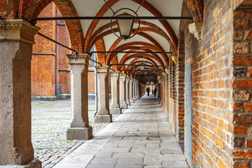 Corridor of arches in Lubeck, Northern Germany. Market Square. June 2017.