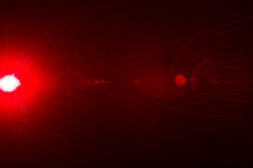 Camera lens flare by laser light create circles of objective and interference effect and moire on digital sensor on dark black background