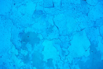 Tableaux ronds sur plexiglas Vieux mur texturé sale Photo of the intense blue colored rough stucco wall texture