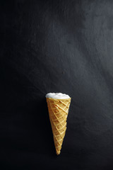 ice cream on black background, top view, place for text