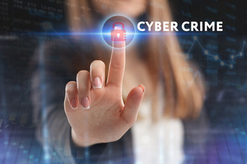 The concept of business, technology, the Internet and the network. A young entrepreneur working on a virtual screen of the future and sees the inscription: Cyber crime