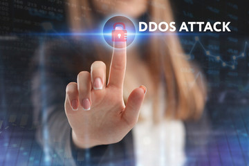 The concept of business, technology, the Internet and the network. A young entrepreneur working on a virtual screen of the future and sees the inscription: Ddos attack
