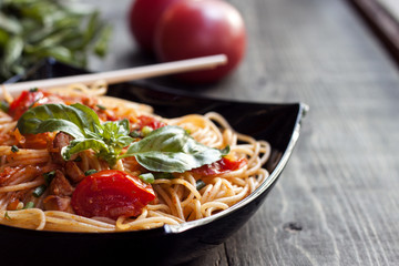 Spaghetti in tomato sauce with chicken