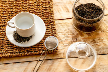 Tea set on the wooden background  top view