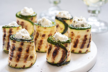 Grilled zucchini rolls stuffed with cream cheese