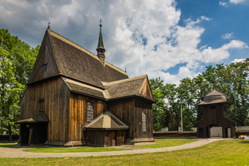 Fototapeta na wymiar Wooden church near cistercian abbey in Mogila in district Cracow, Malopolska, Poland