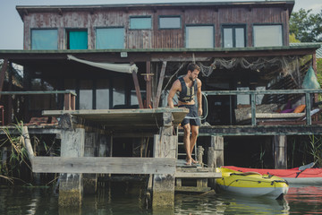 Fototapeta na wymiar Kayaker Standing on Deck