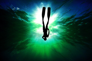 Silhouette of an freediver