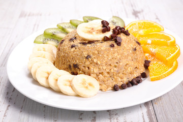 healthy breakfast with oatmeal and fruit