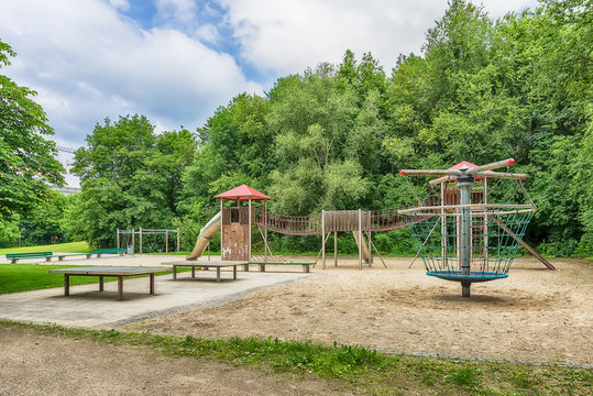 Munich, Germany - June 09, 2018: Colorful playground on yard in the park.