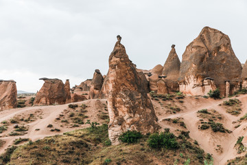 Fototapeta premium scenic landscape with eroded bizarre rock formations in famous cappadocia, turkey
