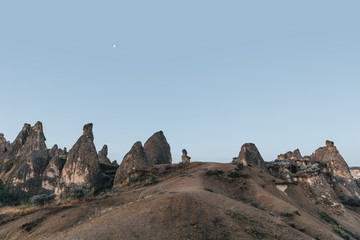 beautiful landscape with bizarre rock formations at evening, rock formations, turkey