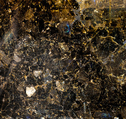 Black and gold patterned natural of dark marble background texture for design.