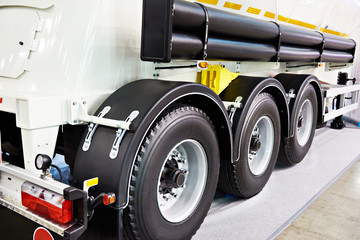 Obraz na płótnie Canvas Three wheels semi-trailer with tank