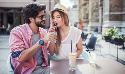 Romantic couple at the meeting in a cafe. Dating, love, relationships