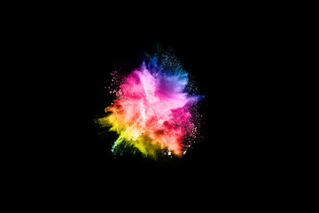 Multicolor powder explosion on black background. 