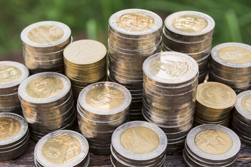 Saving money concept with money coin stack growing for business. financial and accounting concept.