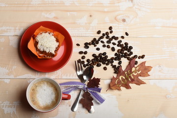 Leaf with word coffee written on. Ceramic tableware with coffee,