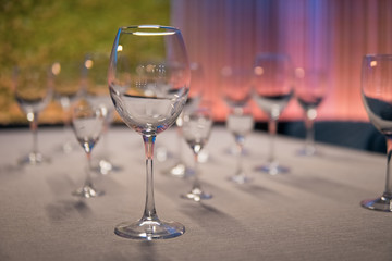 set of shiny wineglasses in restaurant;