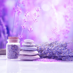 Obraz na płótnie Canvas Spa still life with stack of stones and lavenders