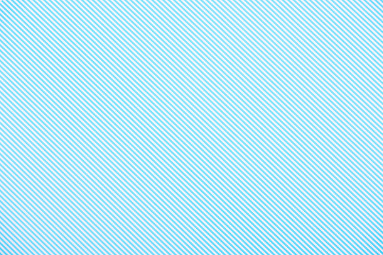Striped diagonal blue and white pattern texture