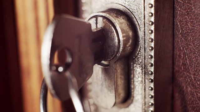 door lock with key closeup. shallow depth of field.
