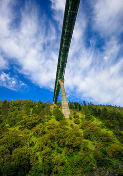 Looking Up At A High Bridge From Underneath