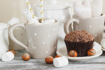 Teapot, cupcakes and different decorations