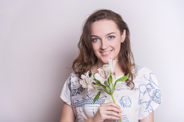 Woman with a flower. Woman on white background.