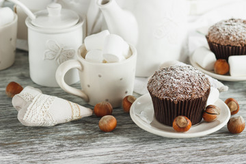 Teapot, cupcakes and different decorations