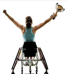 one caucasian young handicapped tennis player woman in welchair sport tudio in silhouette isolated...