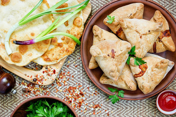 Samosa samosa samosas sambusa somsa - traditional uzbek patties with meat shaped triangle