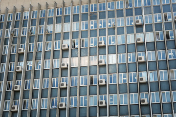 Facade of a multistory building with windows