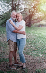 Senior couple in love relaxing in the park