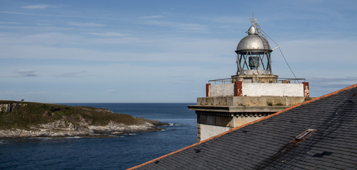 Fototapeta na wymiar Asturias, Spain; September 27, 2017: Lighthouse of the town of Luarca