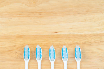 Tooth brush on wood background