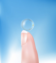Fototapeta na wymiar Contact lens with high-tech chip resting on a finger. Technology of the future